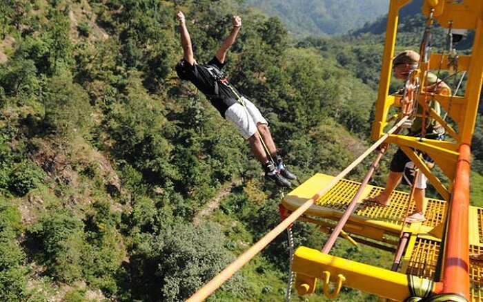 A boy in Black T-shirt Bungee Jumping in Rishikesh