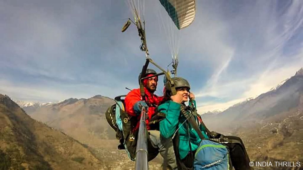 Girl enjoying paragliding in kullu