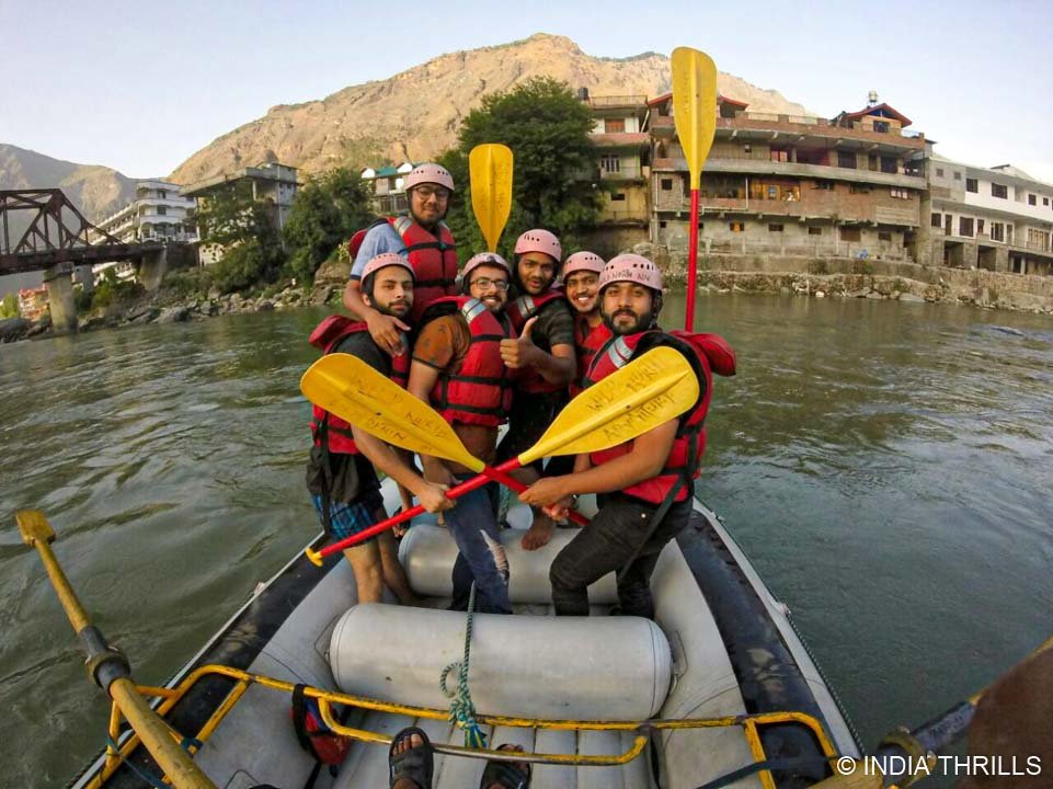 Friends enjoy kullu rafting near pirdi bridge