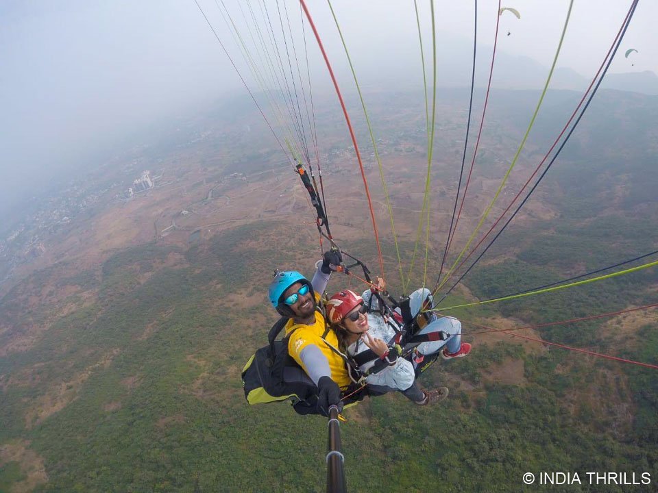 travellers having fun during kamshet paragliding