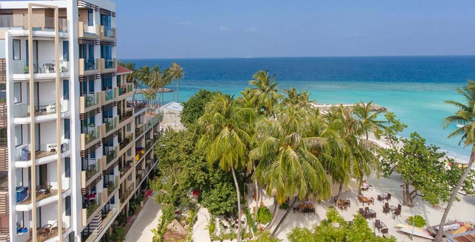 Exterior and beach view of Arena beach hotel
