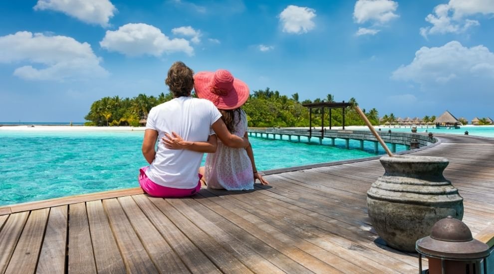 Couple enjoying affordable holiday in maldives